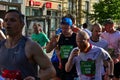 Riga, Latvia - May 19 2019: Marathon runners drinking water in big crowd