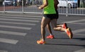 Marathon runners running on city road