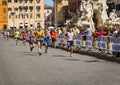 Marathon runners in Piazza Navona during the twenty-second edition of the Rome marathon race Rome Marathon