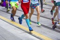 Marathon runners race in city streets