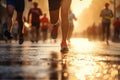 Marathon running in the light of evening, running on city road detail on legs, Athletes Royalty Free Stock Photo