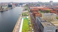 Marathon running race, aerial view of start and finish line with many runners from above, road racing, sport competition