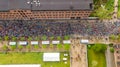 Marathon running race, aerial view of start and finish line with many runners from above, road racing, sport competition Royalty Free Stock Photo