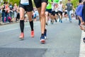 Marathon running race, many runners feet on road racing, sport competition, fitness healthy lifestyle concept Royalty Free Stock Photo