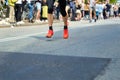 Marathon running race, many runners feet on road racing, sport competition, fitness healthy lifestyle concept Royalty Free Stock Photo