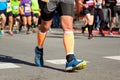 Marathon running race, people feet on road, sport concept Royalty Free Stock Photo