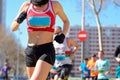 Marathon running race, woman runner on road