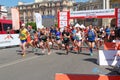 Marathon, starting line. Run competition. Men and women running. Starting gate