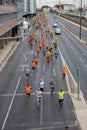 Marathon on the streets of Lisbon. Active people. Group of runners in the city. Urban sport. Competition and healthy activity.