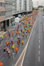 Marathon on the streets of Lisbon. Active people. Group of runners in the city. Urban sport. Competition and healthy activity.