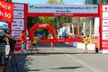 Marathon winner woman at finish. Happy marathon runner finish line Royalty Free Stock Photo