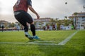 Marbella - January 17, 2020: The player kicking the ball on the football field