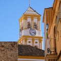 Marbella old town church bell tower clock Royalty Free Stock Photo