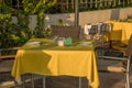 Yellow table in outdoor restaurant in Marbella