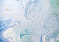 Marble abstract acrylic background. Blue marbling artwork texture. Golden glitter. Royalty Free Stock Photo