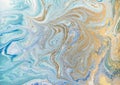 Marble abstract acrylic background. Blue marbling artwork texture. Golden glitter.