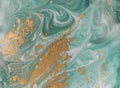 Marble abstract acrylic background. Nature green marbling artwork texture. Golden glitter. Royalty Free Stock Photo