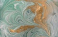 Marble abstract acrylic background. Nature green marbling artwork texture. Golden glitter. Royalty Free Stock Photo