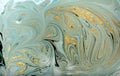 Marble abstract acrylic background. Nature green marbling artwork texture. Golden glitter. Royalty Free Stock Photo