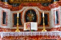 Marble altar with holy bible and candlesticks at Christmas