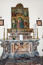 Artworks inside the cathedral of San Nicola di Bari in Taormina. Polyptych, painting, marble. Sicily, Italy.