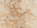 Marble background, white rock. Marble with cracks. Beige, yellow and brown natural colors. Background Royalty Free Stock Photo