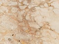 Marble background, white rock. Marble with cracks. Light gray, beige and brown natural colors. Background Royalty Free Stock Photo