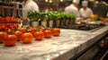 Marble benchtop alongside a black granite surface,home kitchen scene with an array of fresh ingredients and cookware on the Royalty Free Stock Photo