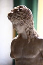 Marble bust of the ancient Greek deity Eros, close-up