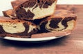 Marble cake in white plate cut into pieces a la carte Royalty Free Stock Photo