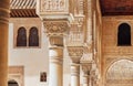 Marble capitals and stucco decoration of the portico in Court of Myrtles in Comares Palace Alhambra, Andalusia, Spain. Magic Royalty Free Stock Photo