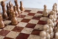 Marble chess board with two pawns opposing each other Royalty Free Stock Photo