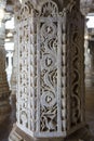 Marble column carved with a beautiful bird and flower pattern in the Jain temple Adinatha temple in Ranakpur, Rajasthan, India