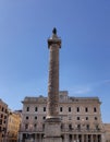 Marble column of Marcus Aurelius with spiral relief on Piazza Colonna, Rome, Italy. Royalty Free Stock Photo