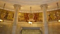 Marble columns and wall murals in the Kievskaya metro station in Moscow