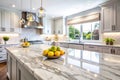 A Marble Countertop with Blurred of a Bright, Modern Kitchen. The Soft Focus on the Interior Background Highlights. Making it Royalty Free Stock Photo