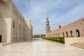 Marble courtyard and flanking minaret of a mosque