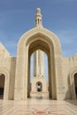 Main minaret and marble courtyard of Sultan Qaboos Mosque Royalty Free Stock Photo