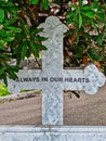 Marble Cross Grave Headstone in Cemetery