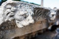 Marble decoration of the building elements in the form of a lion s head. Parts of the ruins and ruins of ancient antiquity