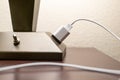 MARBLE FALLS, TX - 20 JAN 2020: iPhone mobile phone USB cord is plugged in