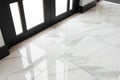 Marble floor tiles in the glass door