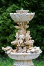 Marble garden water fountain with statues of little boys and fish. The palace and park complex Manor Tarnowski, s.Kachanovka, Ukra Royalty Free Stock Photo