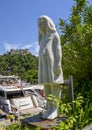 Marble girl on chair sculpture, Museo del Parco in Portofino, Italy Royalty Free Stock Photo