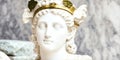 Marble head statue of an ancient Greek goddess athena on vintage ancient greece background. Generative AI