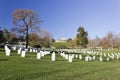 Marble headstones in Section 32 at Arlington National Cemetery with Arlington House above Royalty Free Stock Photo