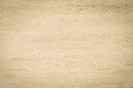 Marble limestone texture background in yellow cream tone