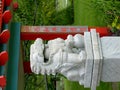 Marble lion amidst Chinese-style architecture (I) Royalty Free Stock Photo