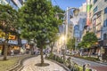 Marble monument shaped in treble clef on Sunshine Street at the east exit of Ikebukuro in Tokyo.The sidewalk curves emphasized by