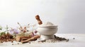 a marble mortar and pestle with various spices and herbs on a white background Royalty Free Stock Photo